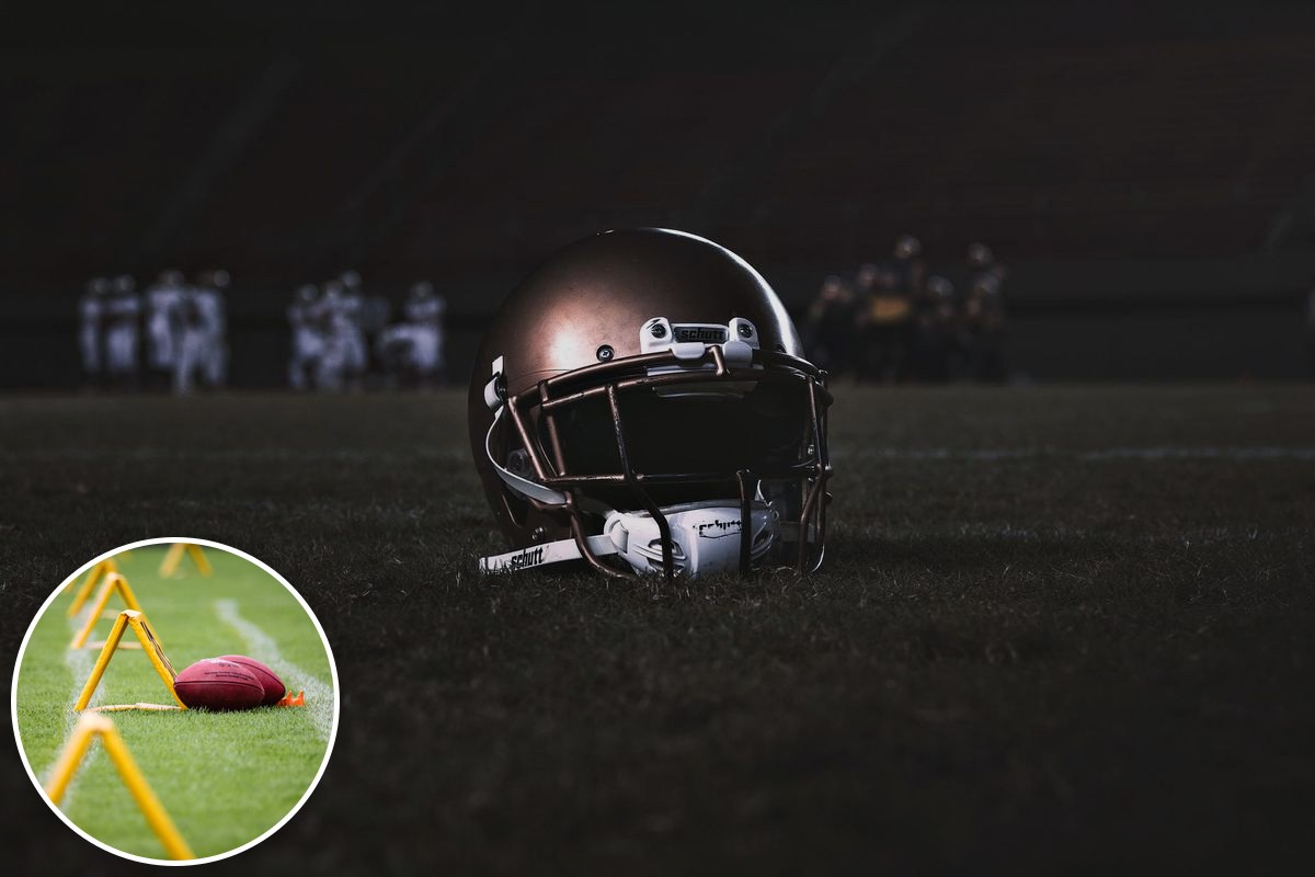 An American football helmet resting on a floodlit field, with a gridiron ball inset.